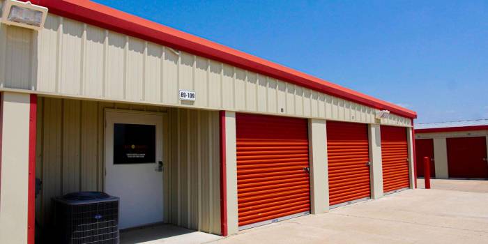 Storage building with roll-up unit doors at Solomon Road Storage